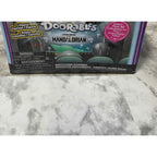 Actual photo detail of Star Wars Doorables Mandalorian Widescreen Moments 3 figures 1 display and warning label