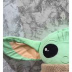 Actual photo detail of Star Wars Grogu plush side ear and soft fabric construction