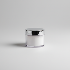 Studio shot of the jar and silver lid on a light surface