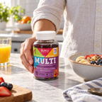 Adult placing SUKU Kids Multi bottle beside breakfast