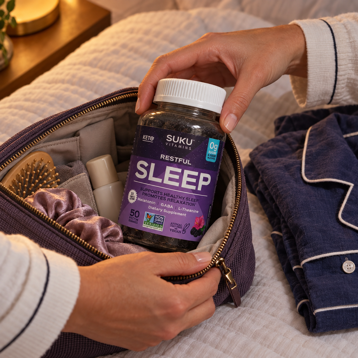Adult packing SUKU Restful Sleep beside pajamas in an overnight pouch