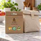 AI-generated lifestyle illustration of one closed SuperBee Small Triple Pack wax wrap package in a lunch bag setting. Background props not included.