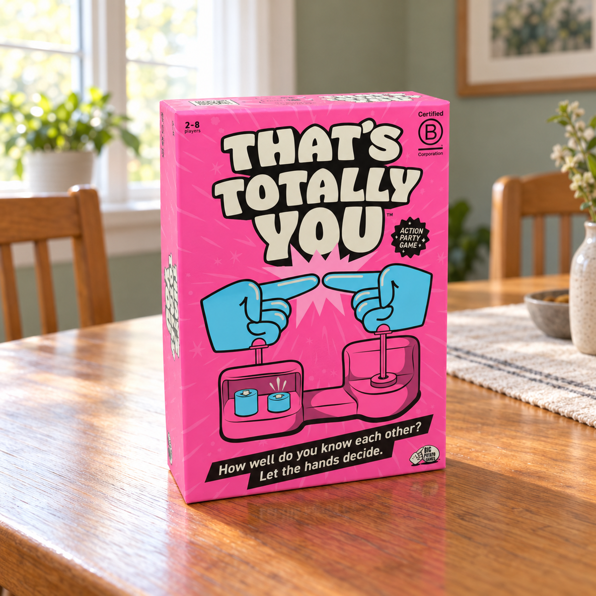 AI-generated lifestyle illustration of the closed pink That's Totally You game box on a sunny oak dining table.