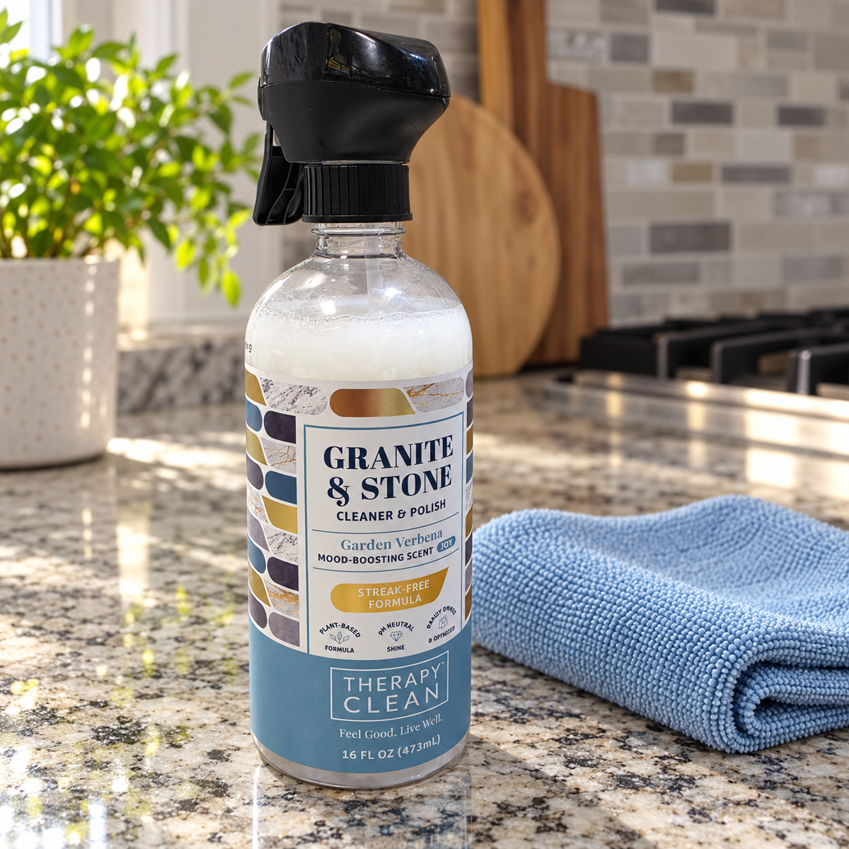 AI-generated lifestyle scene of one Therapy Clean Granite & Stone Garden Verbena 16 fl oz trigger bottle in a granite counter setting. Props not included.