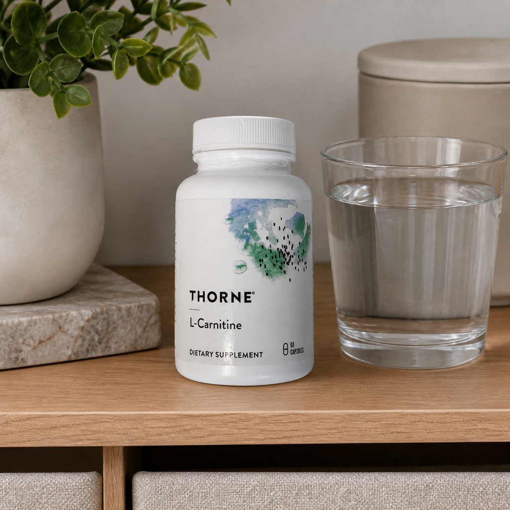 Thorne L-Carnitine 330 mg 60 capsules displayed on a wellness shelf