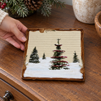 Hand placing the Snow Valley square trivet on a sideboard