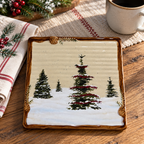 Snow Valley trivet beside a folded napkin and cup