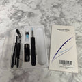 Black UEDAI wireless smart otoscope with blue tips, USB cable, ear-care tools, storage case and original box on a marble-pattern background.