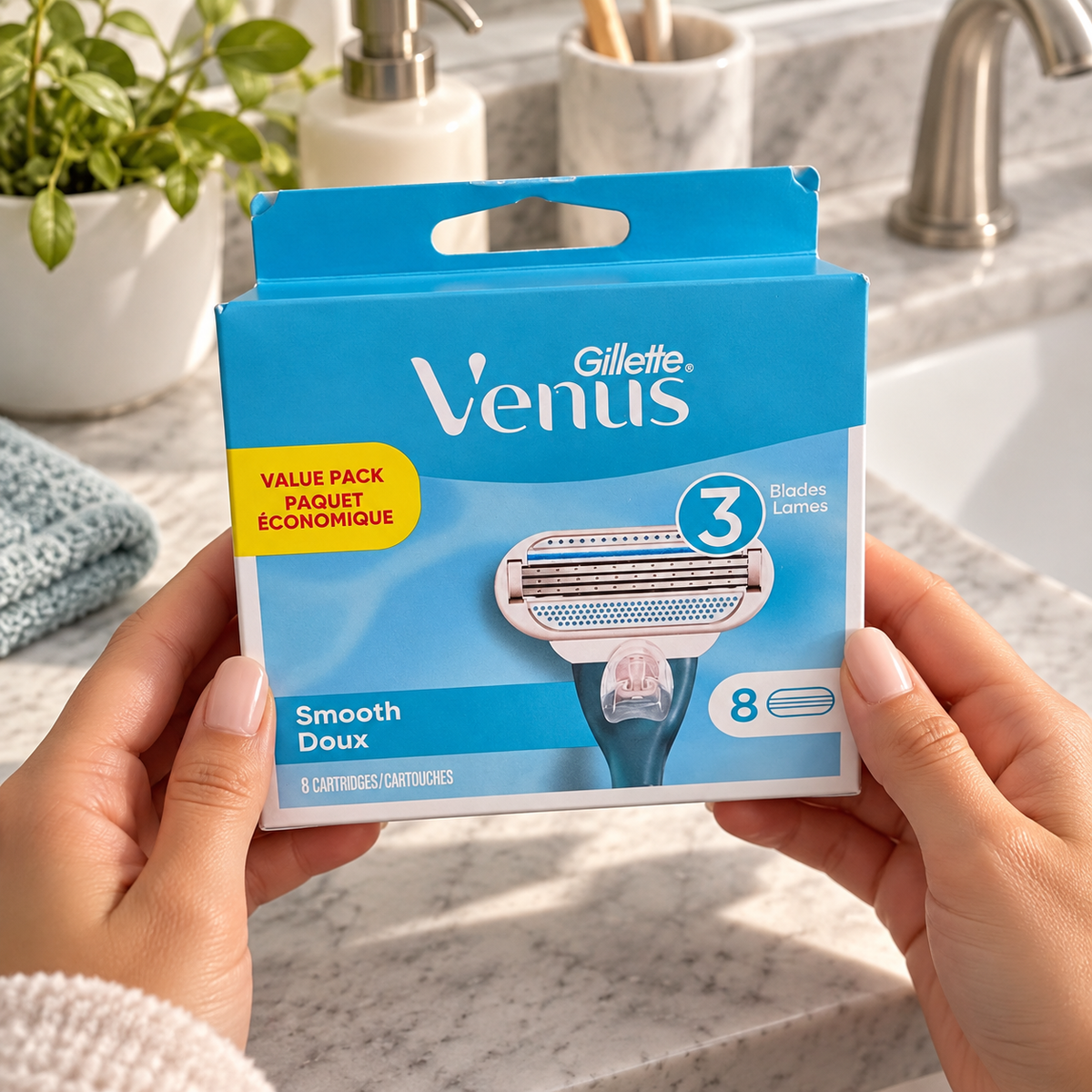 Closed Gillette Venus Smooth eight-cartridge box held beside a bathroom sink