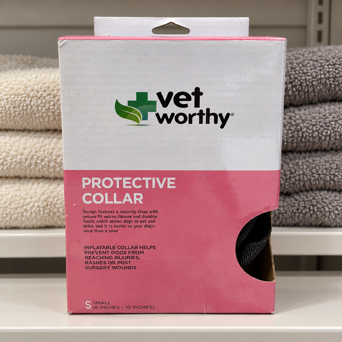 AI-generated lifestyle scene of one boxed Vet Worthy protective collar, Small 6–10 inch example, in a supply shelf setting. Select the appropriate size; props not included.