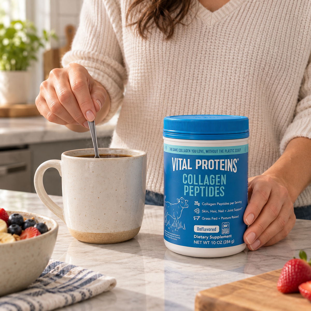Stirring a morning drink beside one Vital Proteins Collagen Peptides tub
