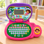 AI-generated lifestyle illustration of the open laptop on a playroom desk, showing the pink and purple VTech Dora design and attached orange mouse.