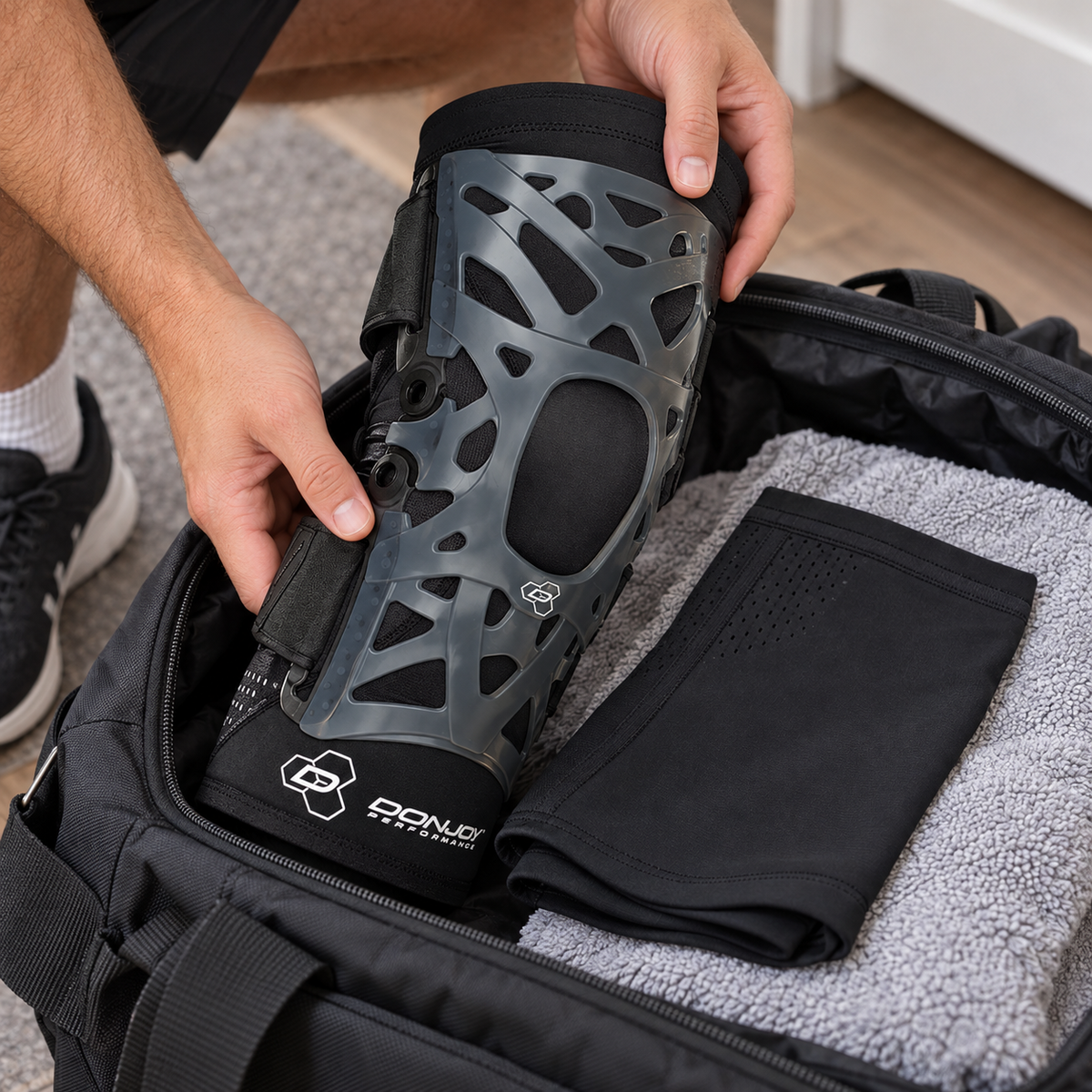 Packing a DonJoy Webtech knee brace into a gym bag