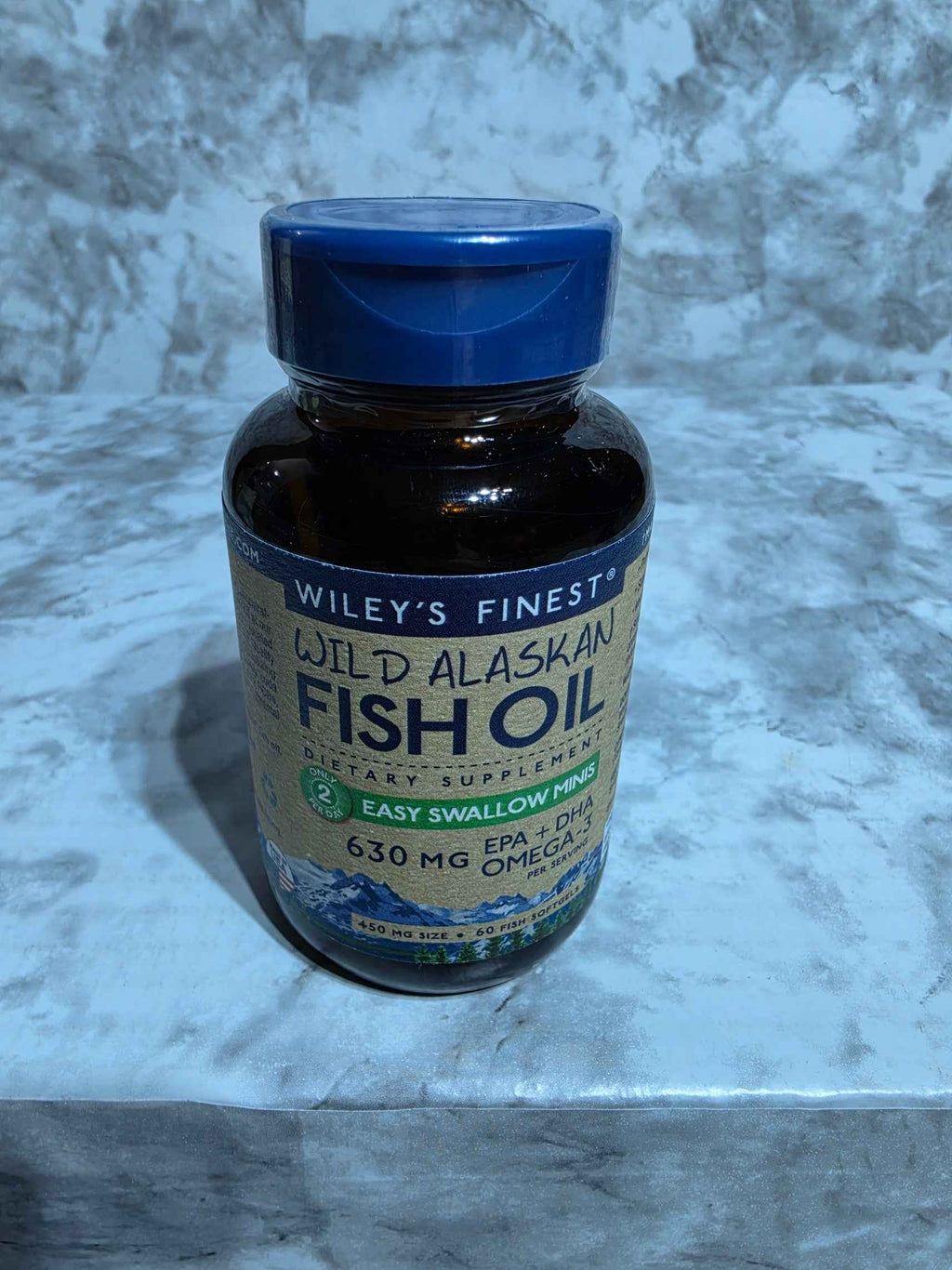 Actual stocked Wiley's Finest Easy Swallow Minis Wild Alaskan Fish Oil bottle, 60 softgels, front label