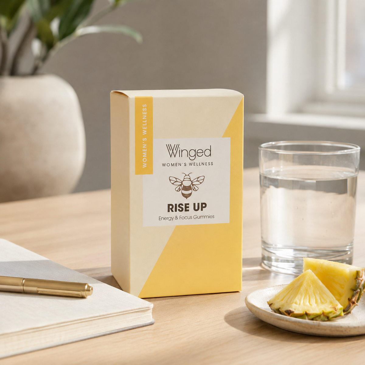 AI-generated context image of Winged Wellness Rise Up pineapple gummies on a clean desk with water