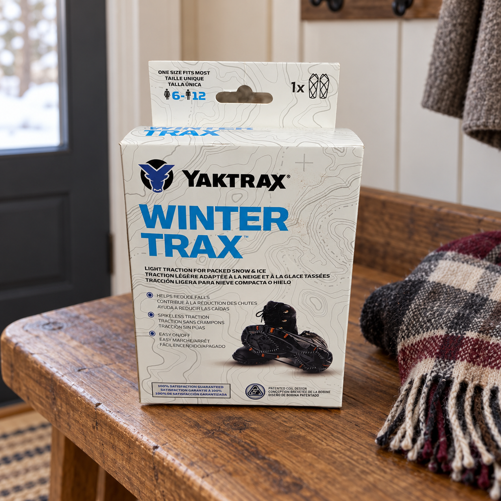 AI-generated lifestyle illustration of one closed Yaktrax WinterTrax package on a entry bench. Background props not included.